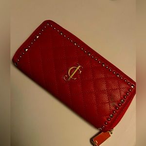 Juicy Couture brand new wallet with small stain on the front.